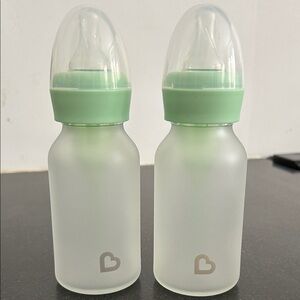 Set of Two munchkin zero plastic Baby Bottles with Green Caps